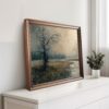 Moody countryside landscape wall art print with serene rural nature featuring trees and fields